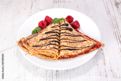 crepe with chocolate and berry