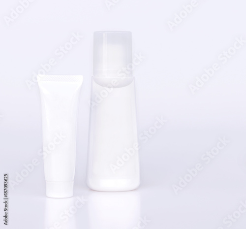 White plastic bottle of cosmetic container isolated on white background.