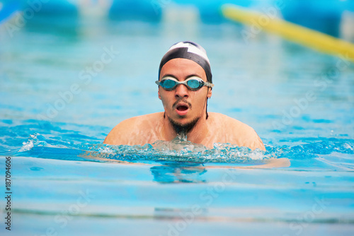 One man swim in pool