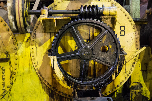 Vintage iindustrial wheels in an old factory photo