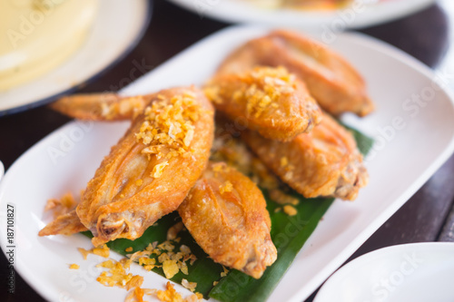 Deep fried chicken wings in Thai style