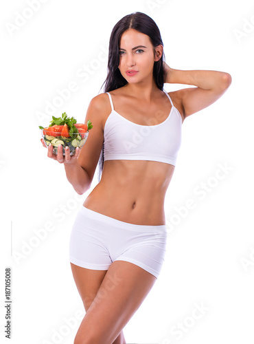 Brunette woman in white fitness clothing © Andrey_Arkusha
