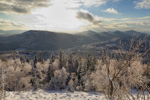 The view from Jedlova hora in Czech Republic. Landscape of Bohemian Switzerland National park in winter. photo