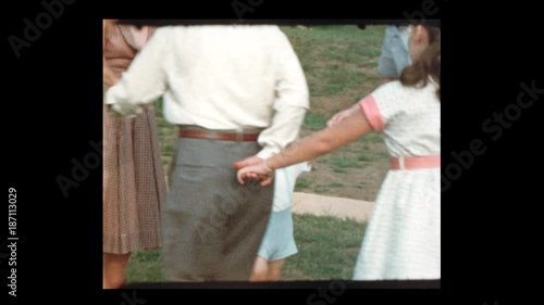 1953 Family plays Ring Around the Rosie with baby boy