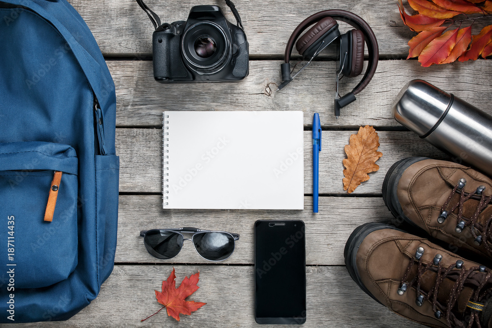 Set of trip stuff on wooden background Set of trip stuff on wooden background