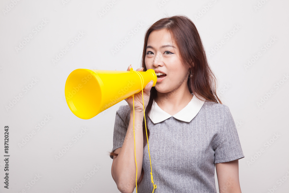 Beautiful young Asian woman announce with megaphone. Beautiful young Asian woman announce with megaphone.