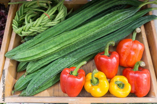 Bell Peppers, Luffa acutangula and long beans at local market