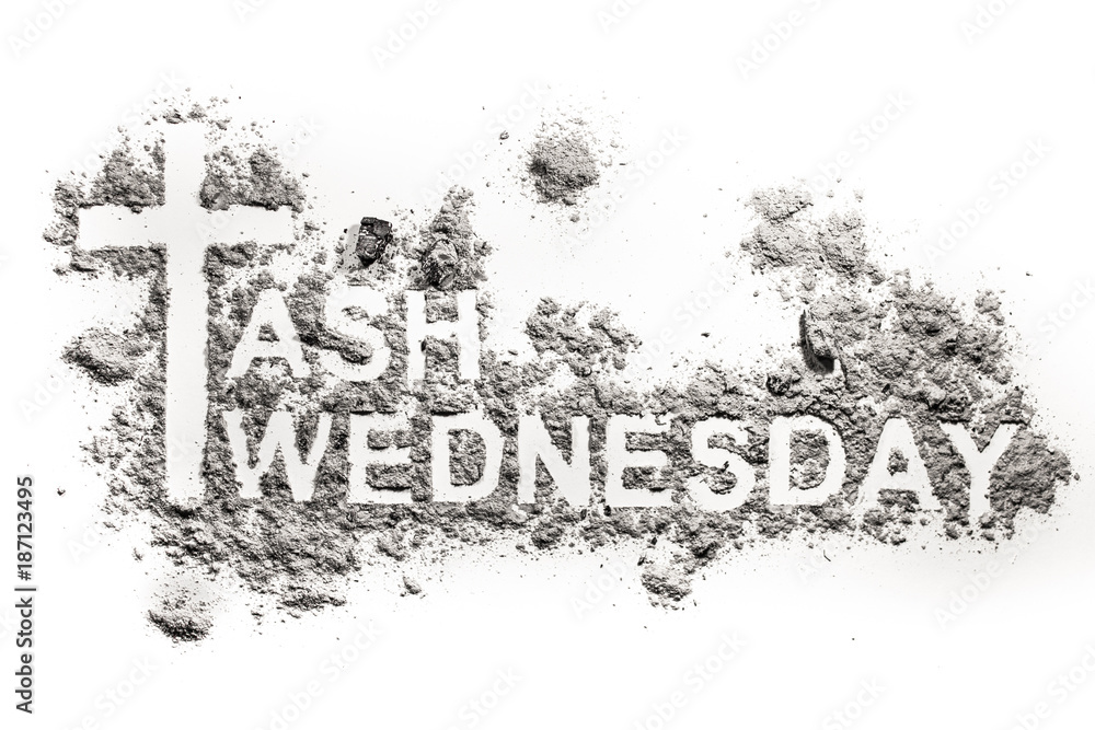 Obraz premium Ash Wednesday word written in ash, sand or dust