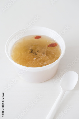 Tremella soup in a white bowl.