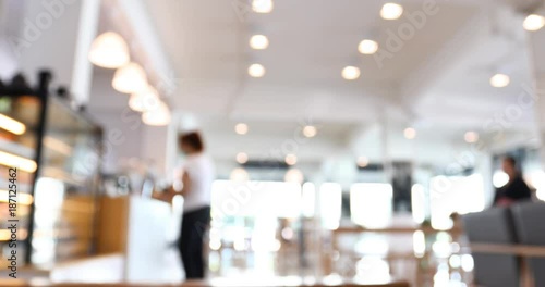 people in modern cafe restaurant, abstract blur scene background