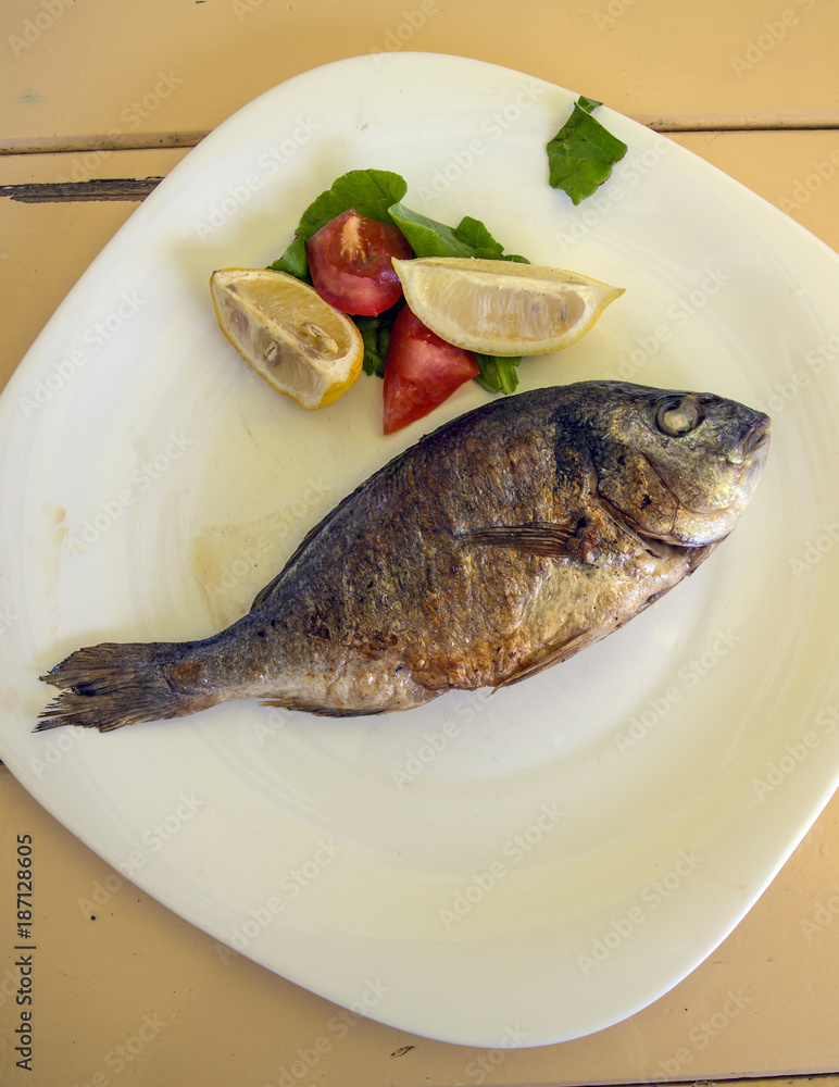 Fish dish - roasted trout with vegetables Fish dish - roasted trout with vegetables