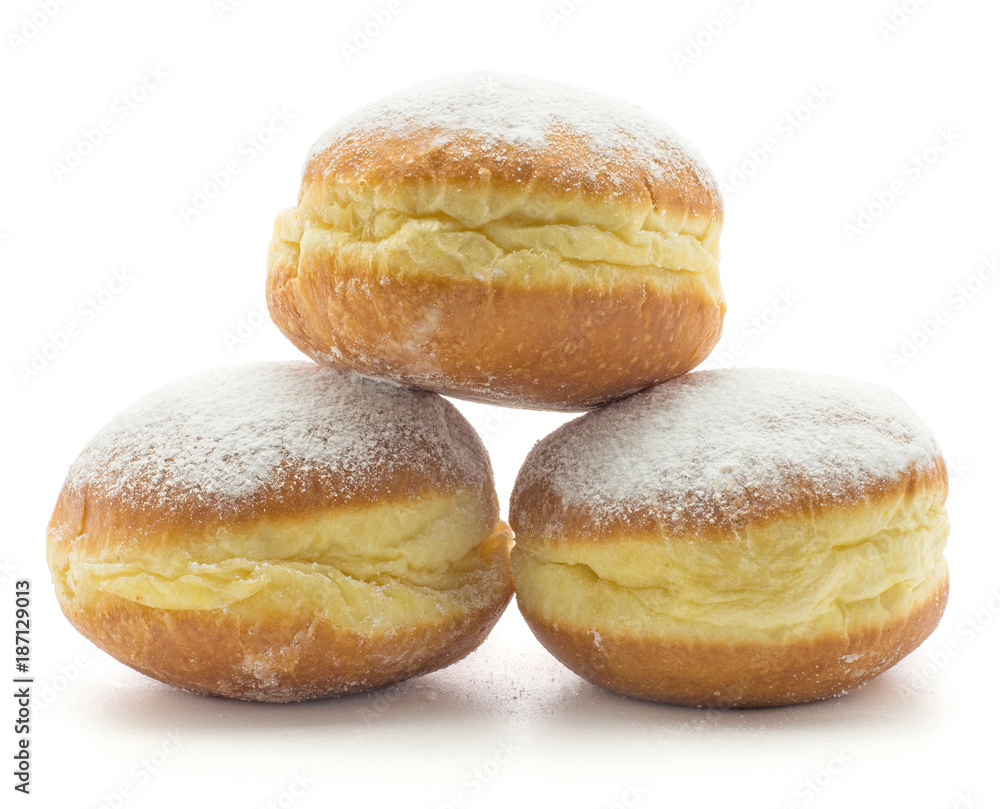 Sufganiyah three traditional doughnut isolated on white background fresh baked with powered sugar without hole.