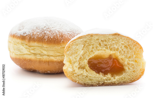 Fotografie Traditional doughnut (Sufganiyah) and one half with apricot jam isolated on white background fresh baked with powered sugar and without hole