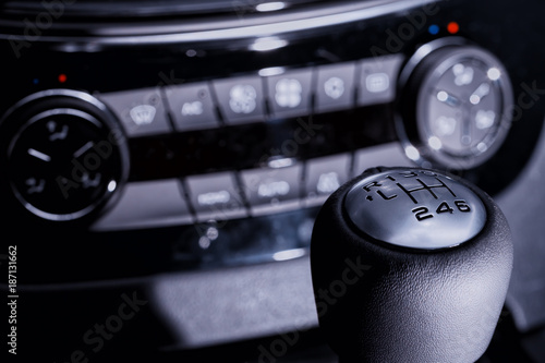 Modern car gear lever and dashboard photo