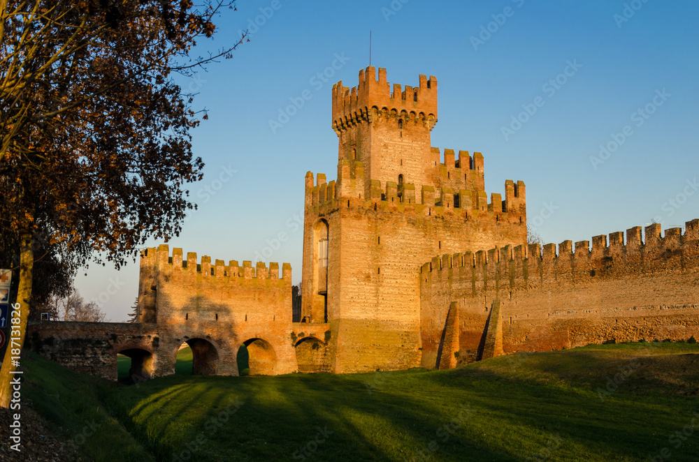 the castle tower, view of the external wall of a castle with a tower