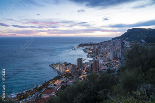 Panoramic view of Monte Carlo in the evening. The Principality of Monaco is situated on a prominent escarpment at the base of the Maritime Alps along the French Riviera.
