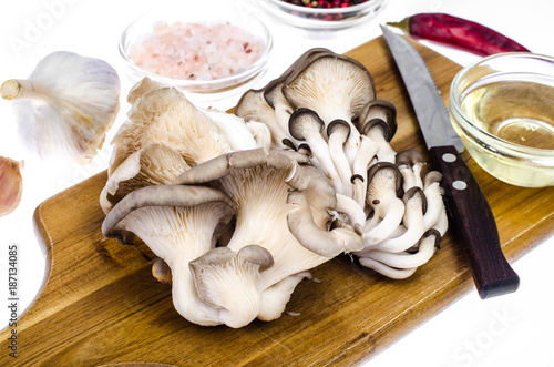 Fresh mushrooms on the kitchen cutting