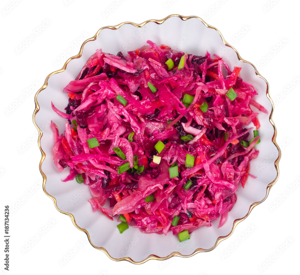 Vegetable salad with raw beets, carrots and cabbage