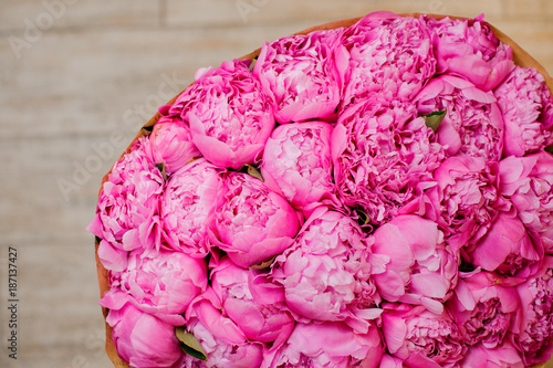 nice big bouquet of a lot of peonies of rosy color