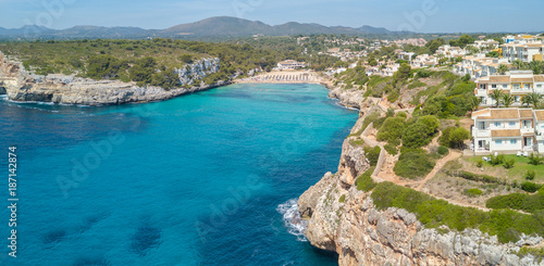 Fototapeta Naklejka Na Ścianę i Meble -  Drone aerial landscape of the beautiful bay of Cala Anguila with a wonderful turquoise sea, Porto Cristo, Majorca, Spain