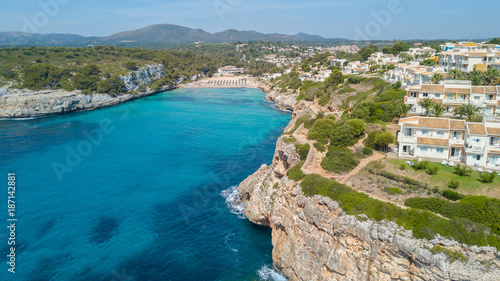 Drone aerial landscape of the beautiful bay of Cala Anguila with a wonderful turquoise sea, Porto Cristo, Majorca, Spain
