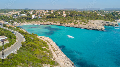 Drone aerial landscape of the beautiful bay of Cala Mandia with a wonderful turquoise sea, Porto Cristo, Majorca, Spain
