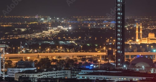 Wallpaper Mural DUBAI, UAE – MARCH 2016 : Timelapse of Jumeirah Mosque from a distance at night with cityscape in view Torontodigital.ca