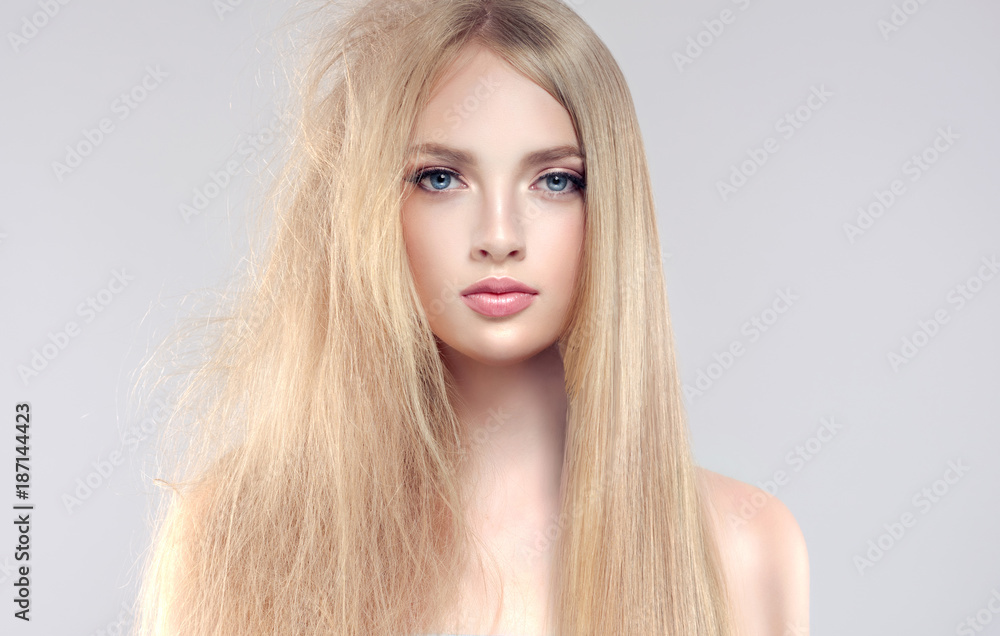 Hair care . Straightening ,smoothing and treatment of the hair . Girl with  straight and smooth hair on