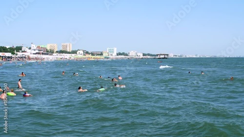 Tourists In The Sea Water, Swimming And Breaking The Waves, Summertime Holidays