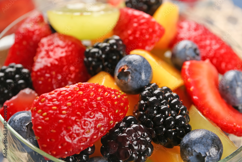 Bowl with delicious fruit salad, closeup Bowl with delicious fruit salad, closeup