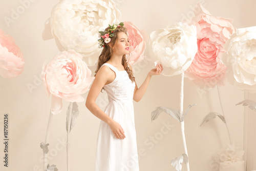 Beautiful young woman near ...