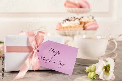 Gift for Mother's day with card and flower on table