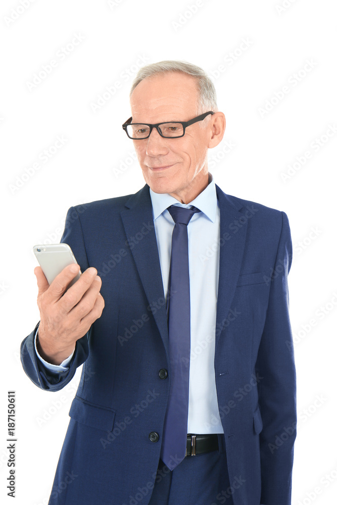 Attractive mature businessman with smartphone on white background Attractive mature businessman with smartphone on white background