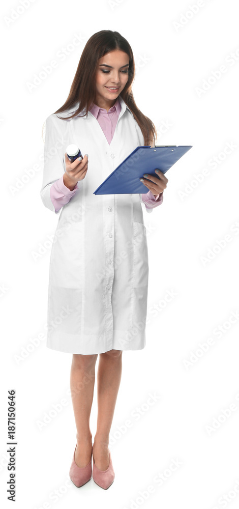 Young female pharmacist with medicament and clipboard on white background Young female pharmacist with medicament and clipboard on white background