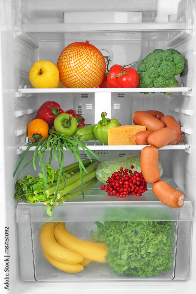 Refrigerator with fresh products, closeup Refrigerator with fresh products, closeup