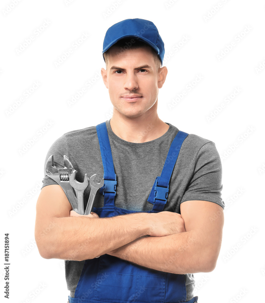 Handsome auto mechanic with tools on white background Handsome auto mechanic with tools on white background