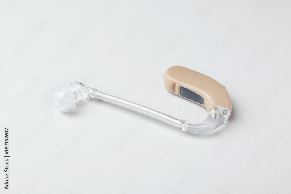 Hearing aid on light background Hearing aid on light background