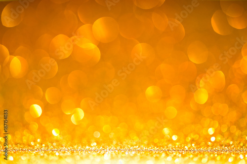 Golden Abstract Background with Bright Bokeh Lights
