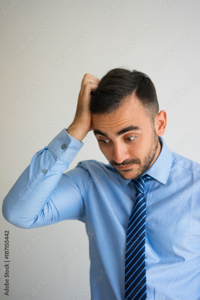 Surprised and Upset Manager Clutching Head Surprised and Upset Manager Clutching Head