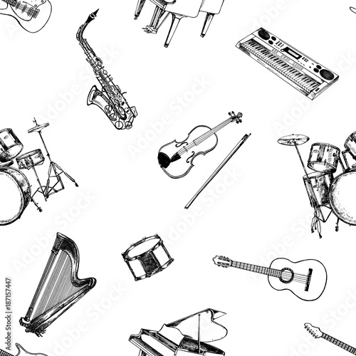 Seamless pattern of hand drawn sketch style musical instruments. Vector illustration isolated on white background.