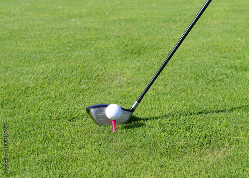 Play golf on the grass, close-up
