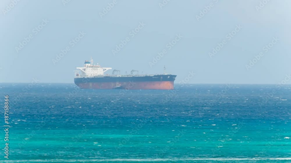Cargo freight ship in the caribbean sea. Freight Transportation. Cargo freight ship in the caribbean sea. Freight Transportation.