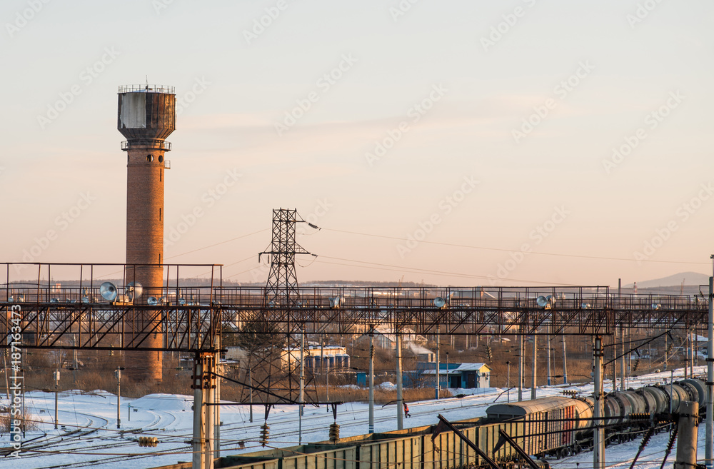 Obraz premium industrial landscape. railway station outdoors in winter