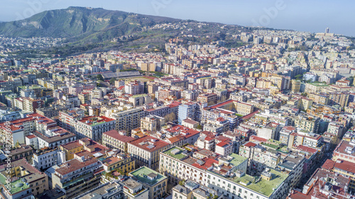 Aerial view of Naples from the Vomero district. The houses and palaces extend in the northern part of the city up to Mount Faito in the background.