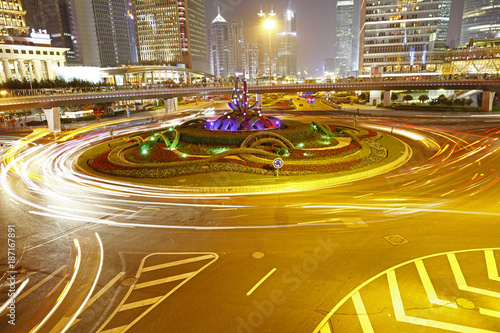 Canvas Print the light trails on the modern building background in shanghai china