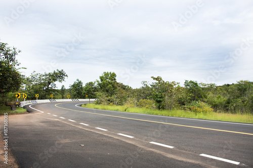 View landscape of highway road on mountain for people go to travel Rock art at Pha Taem National Park in Ubon Ratchathani, Thailand