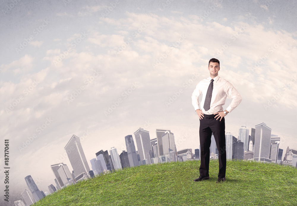 man standing in front of city landscape man standing in front of city landscape