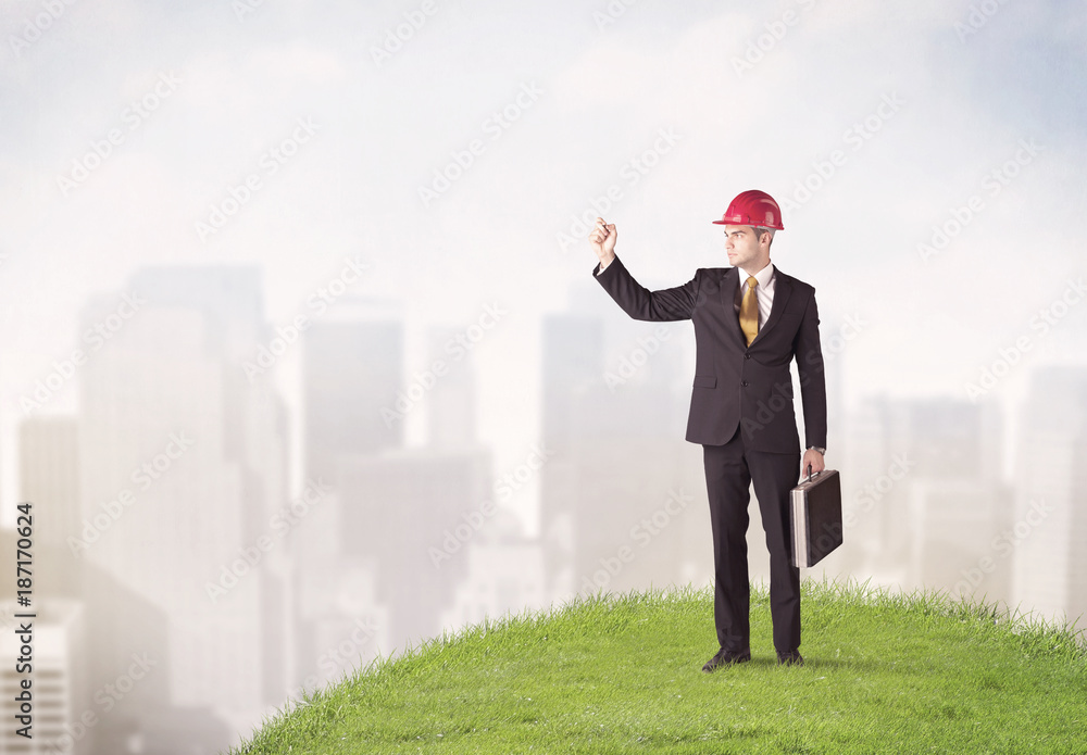 man standing in front of city landscape man standing in front of city landscape