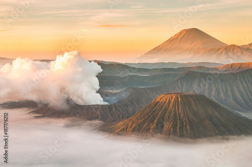 Landscape of Mount Bromo volcano  Batok and Semeru  Mt.  during sunrise from viewpoint on Mount Penanjakan located in Bromo Tengger Semeru National Park  East Java  Indonesia.