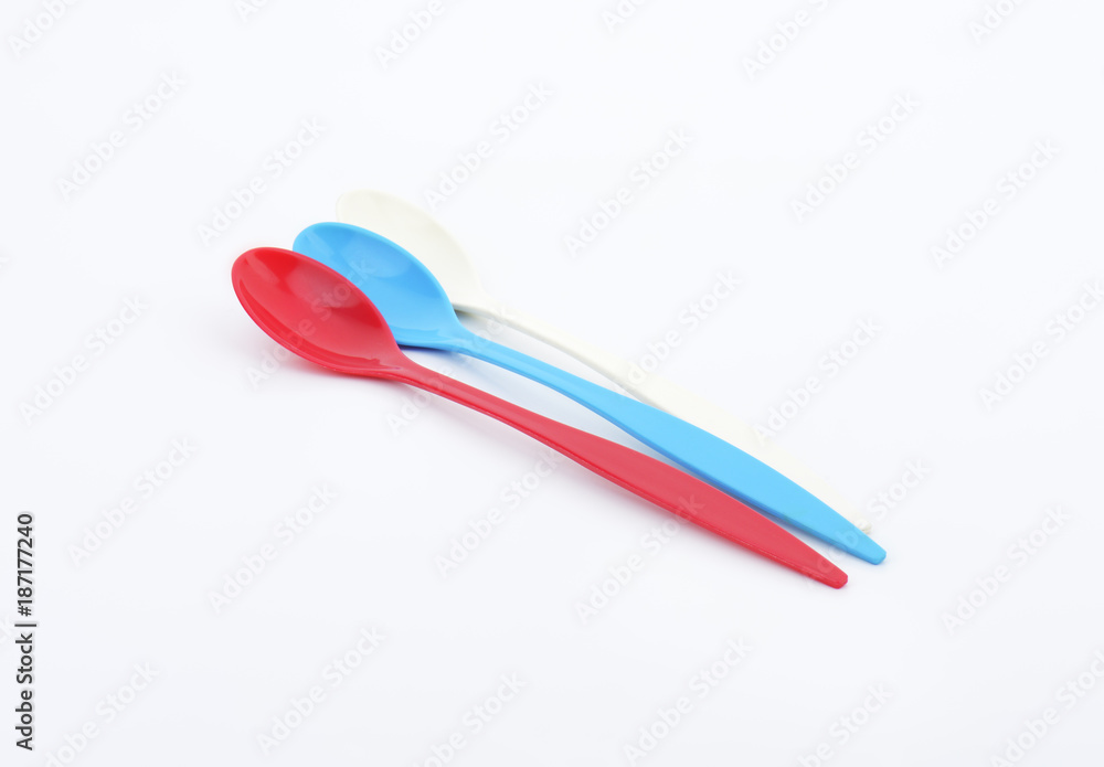 Three long plastic spoons Three long plastic spoons
